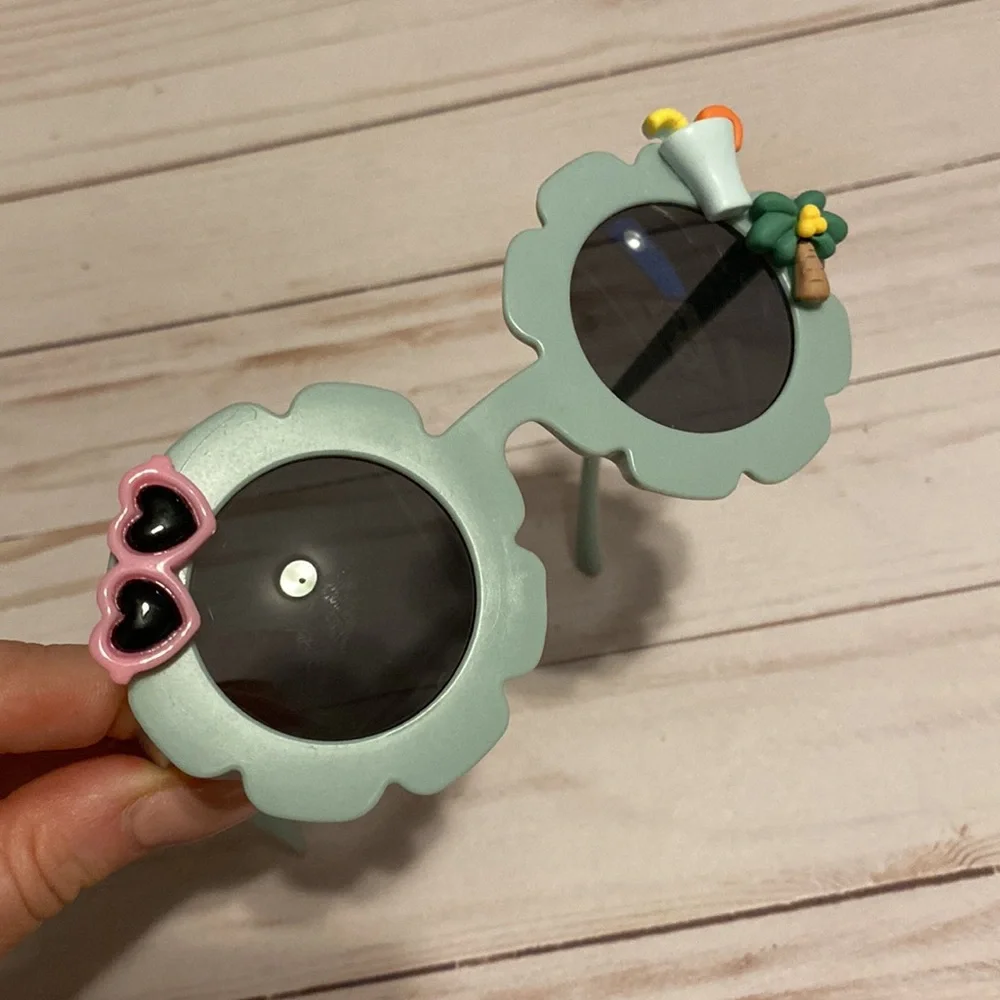 Girls greyish sunglasses w charms